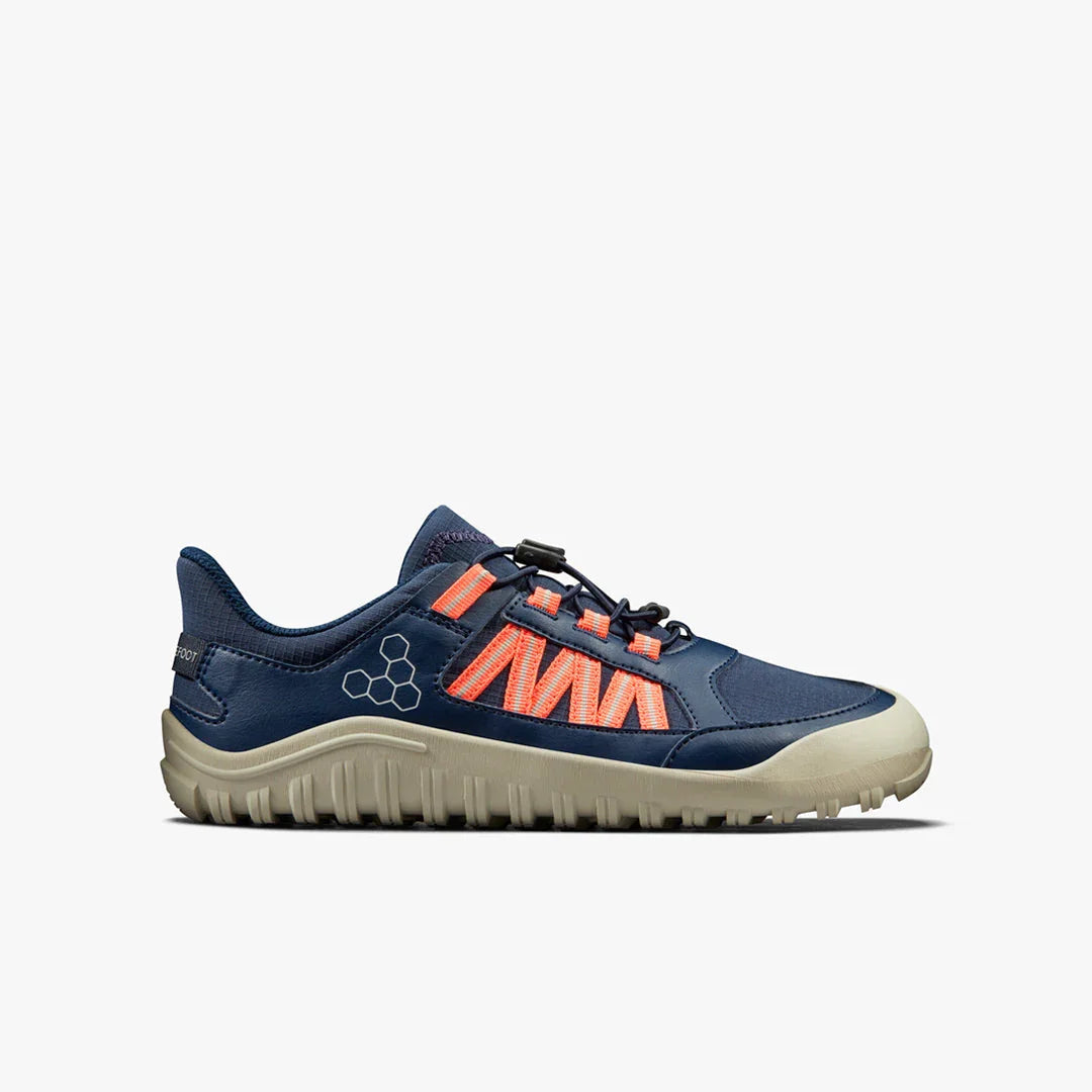 Navy blue and orange Vibram low-profile hiking shoe with rugged beige sole