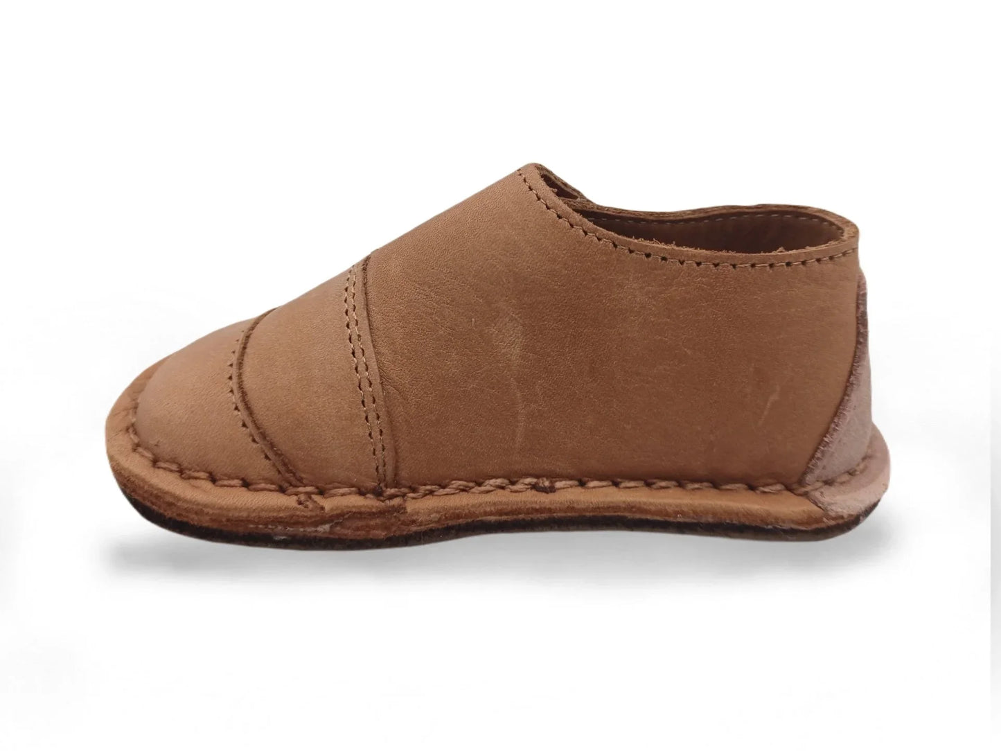 Brown leather handmade baby moccasin with stitched sole and soft lining