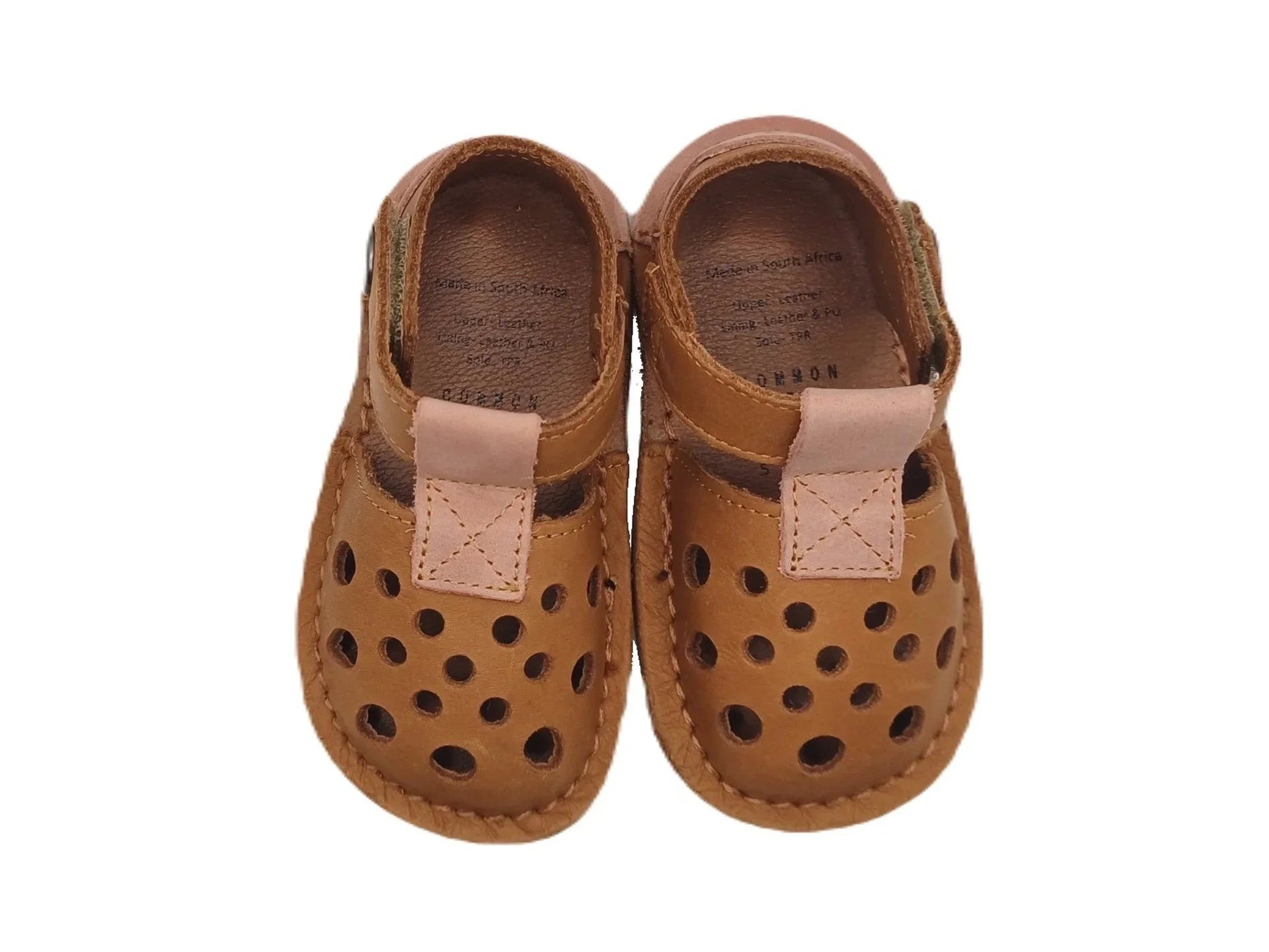 Pair of brown leather baby sandals with round ventilation holes and adjustable straps