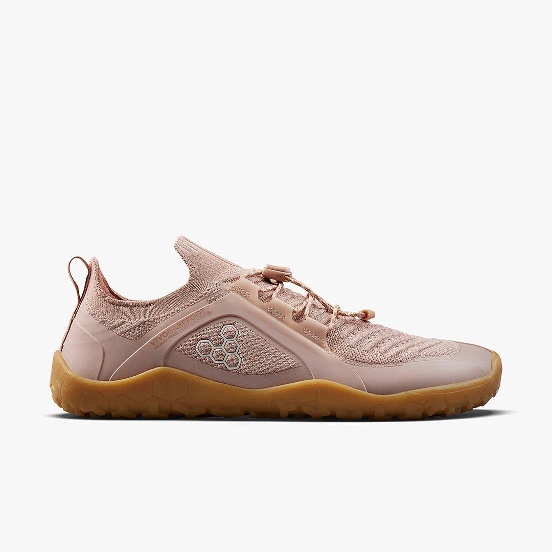 Light pink Vivobarefoot Trail shoes with knitted upper and flexible gum sole, side view