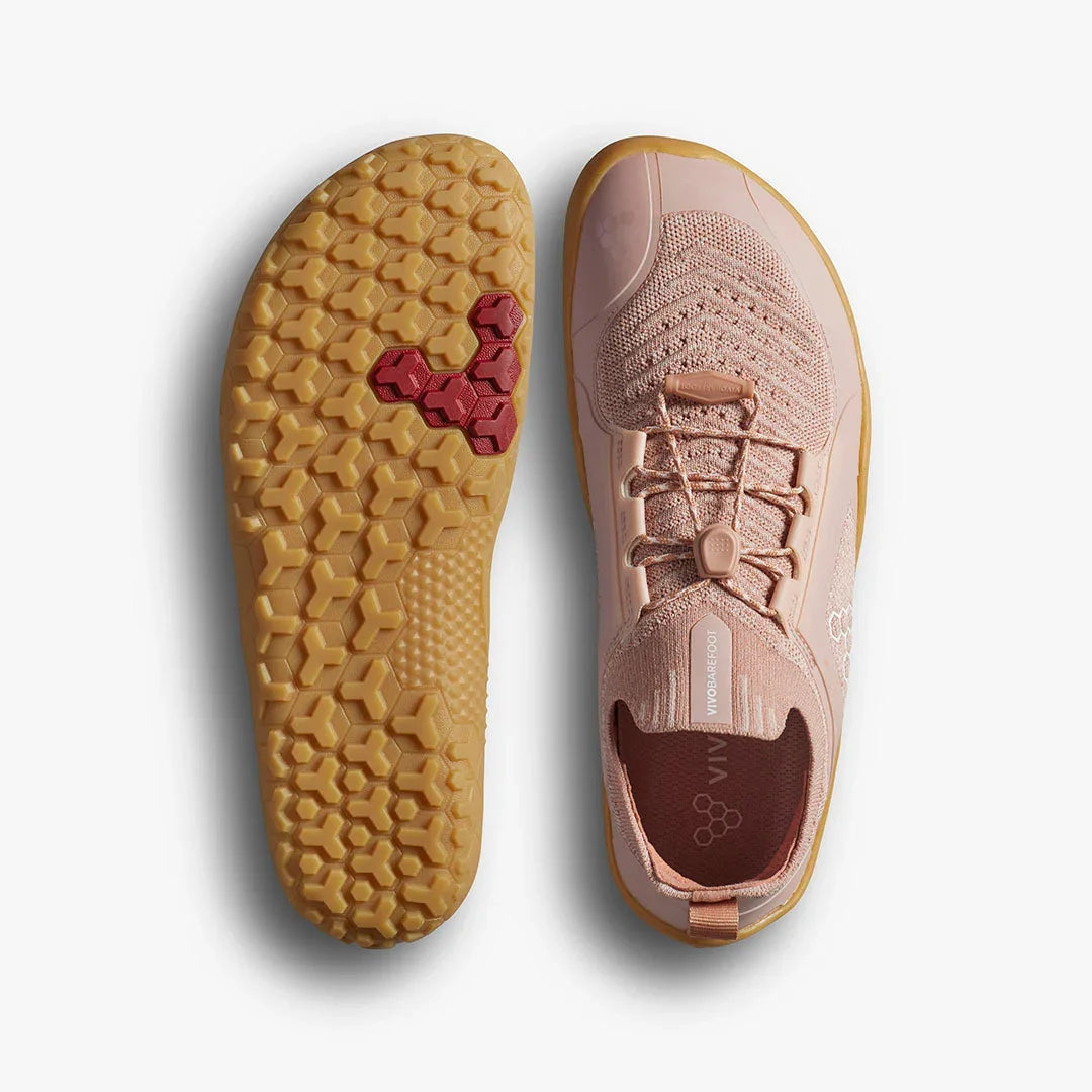 Light pink Vivobarefoot barefoot running shoe with honeycomb-patterned gum sole and elastic laces