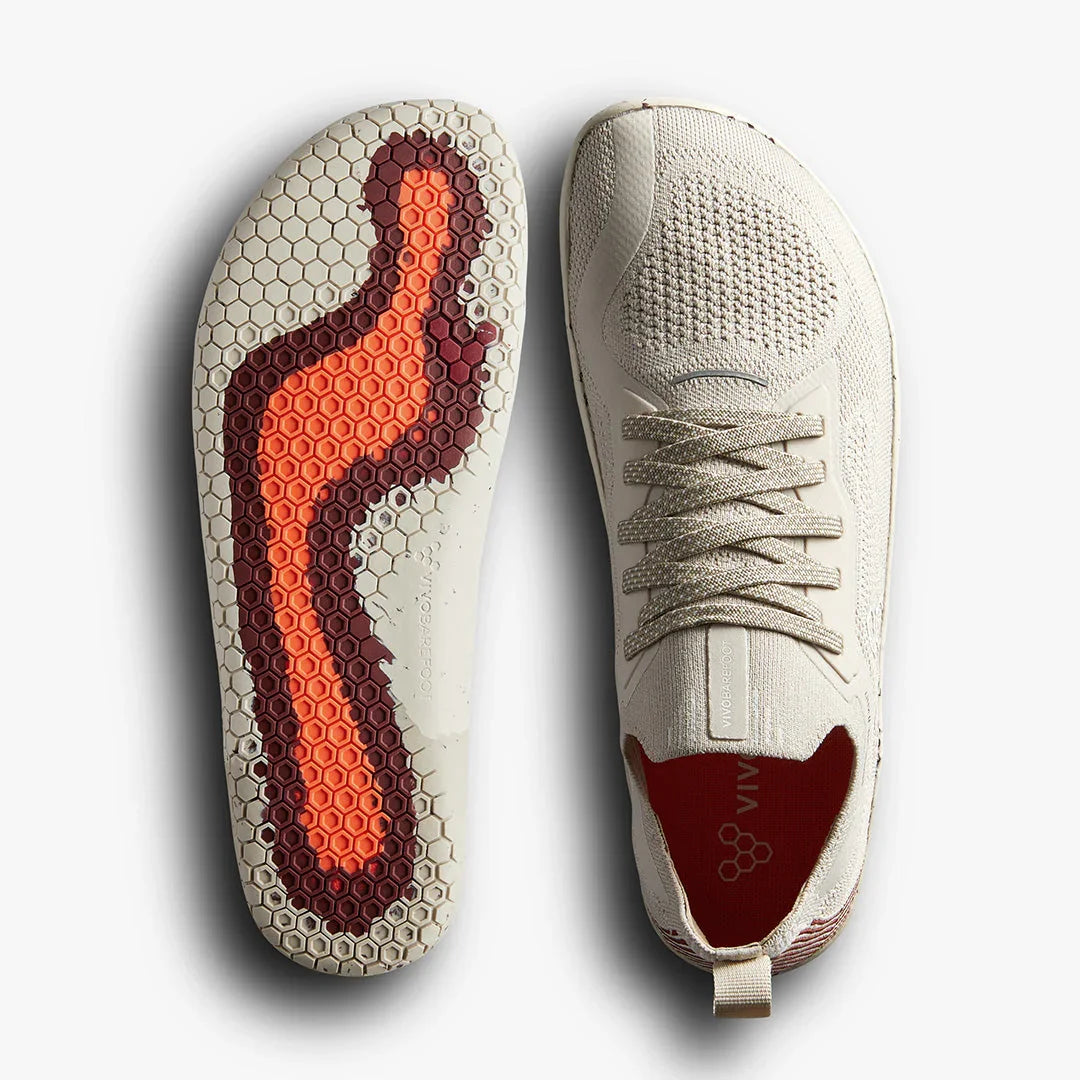 Top and sole view of beige Vivo barefoot knit running shoe with honeycomb tread pattern