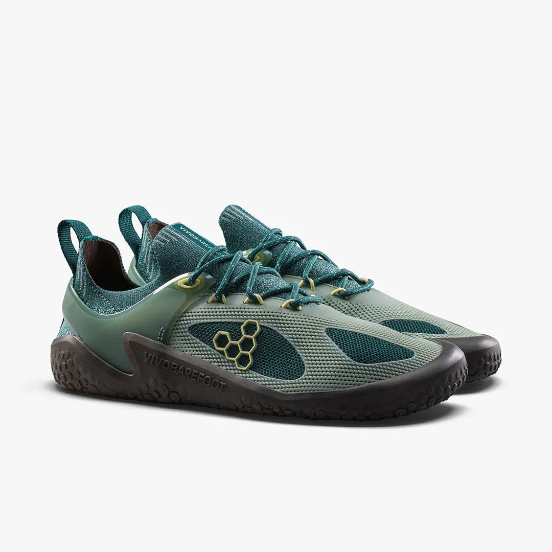 Pair of teal and olive green Vivobarefoot minimalist running shoes with mesh panels and textured black soles