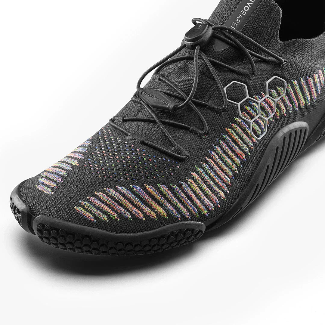 Close-up of black Vivobarefoot minimalist shoe with multicolor knit detailing and adjustable laces