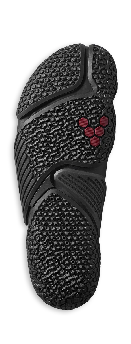 black textured shoe outsole with a mix of hexagonal and wavy patterns and red hexagonal logo