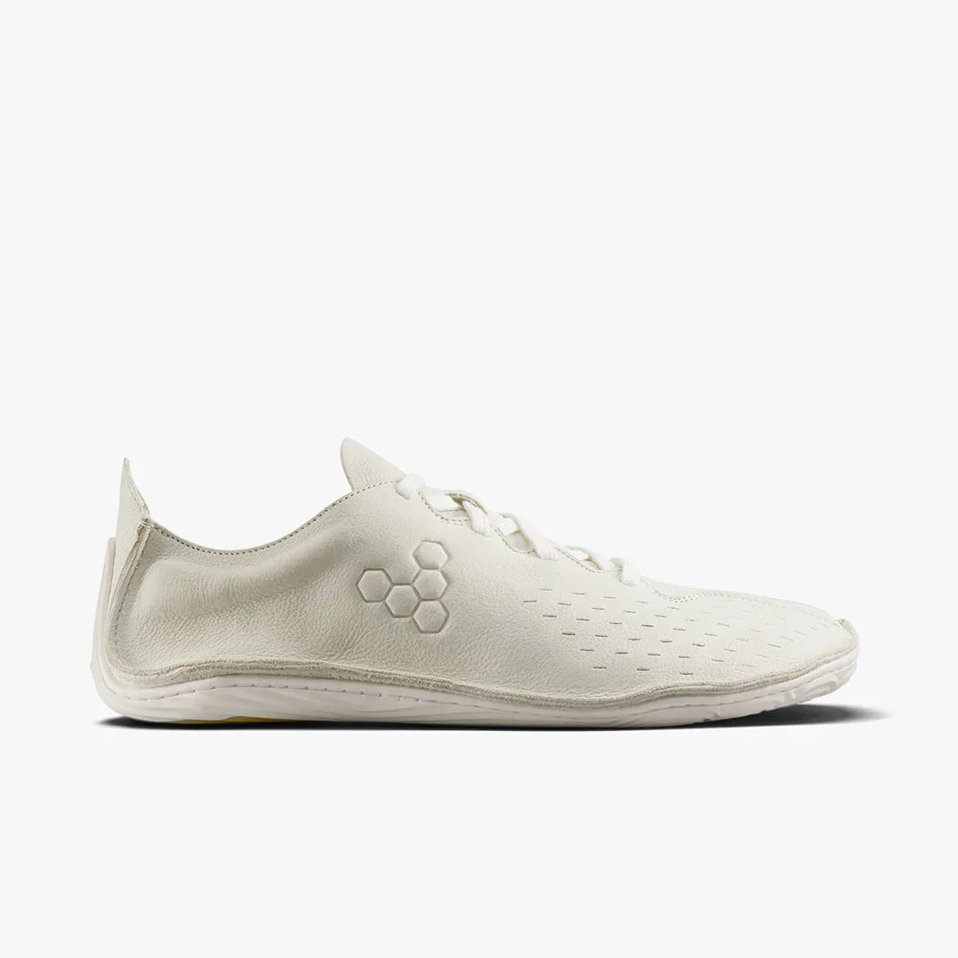 Minimalist white leather barefoot shoe with hexagon logo and perforated side