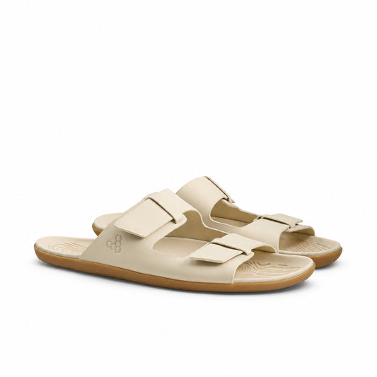 Gold sandal on a white background