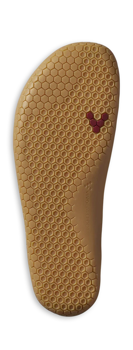 Honeycomb-patterned rubber outsole with Vivobarefoot logo in red, designed for barefoot shoes