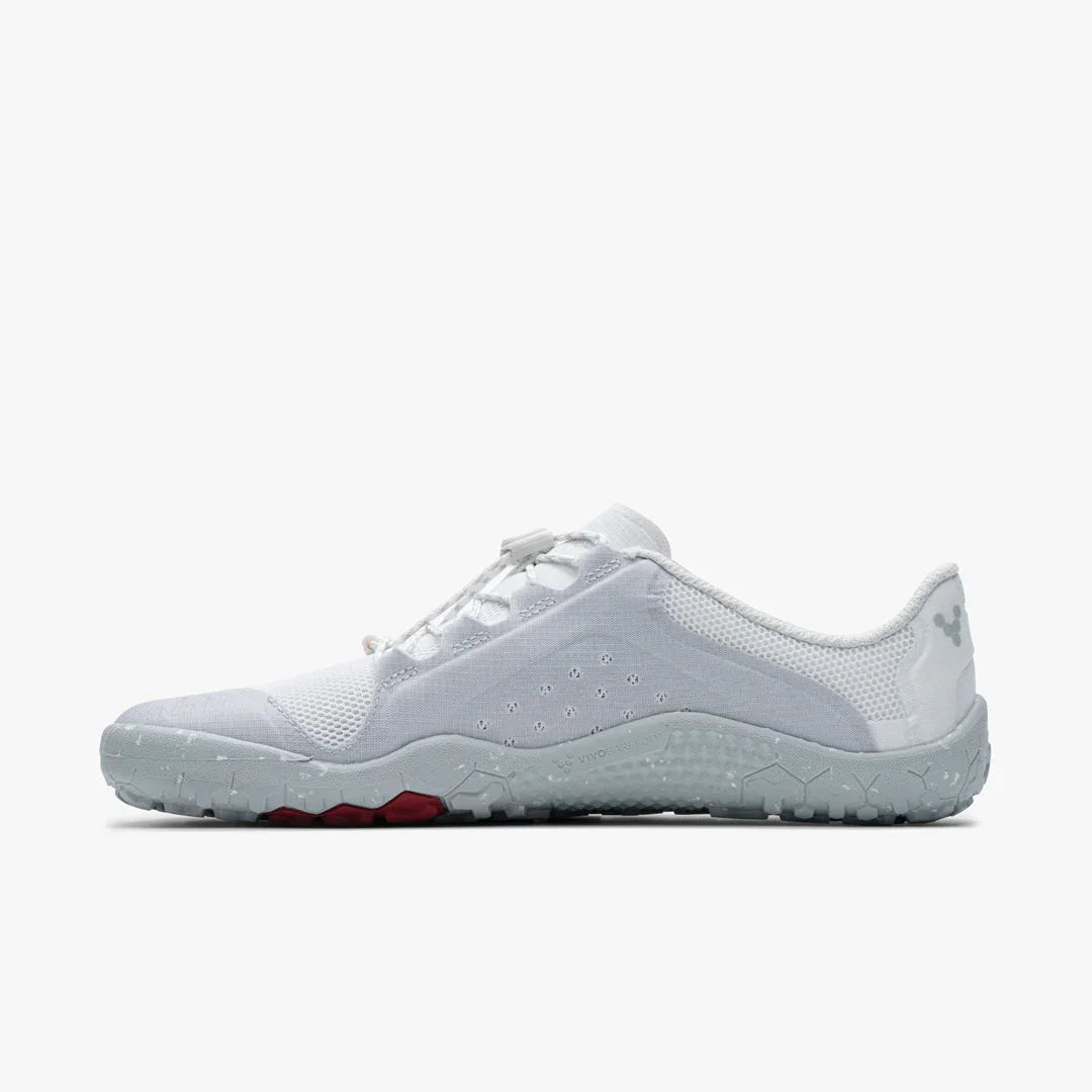 Side view of a white lightweight athletic minimalist shoe with gray sole and textured details