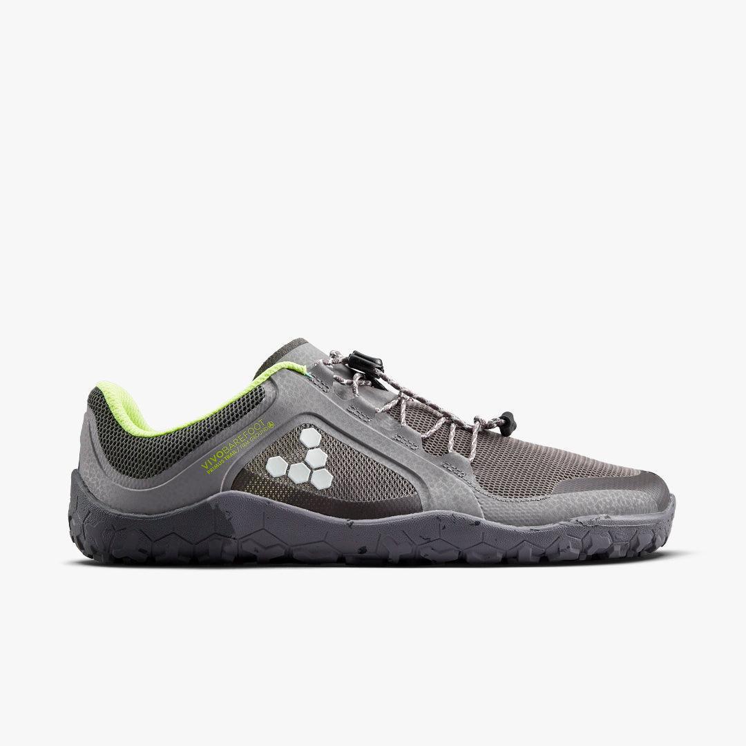 gray and black Vivobarefoot ultra running shoe with neon green lining and unique lacing system