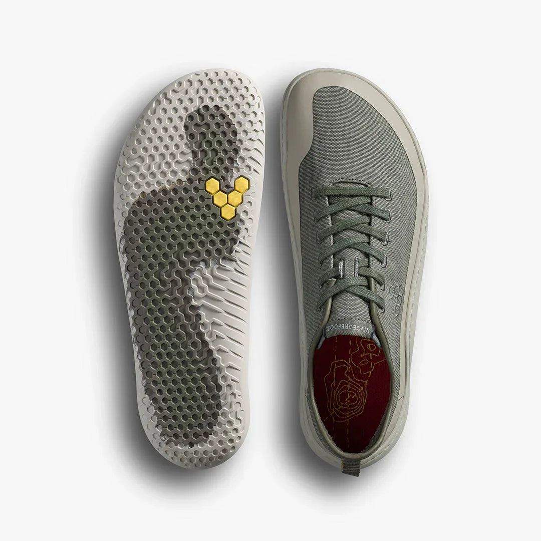 Top view of green Vibram FiveFingers shoes showing textured sole and lace-up design