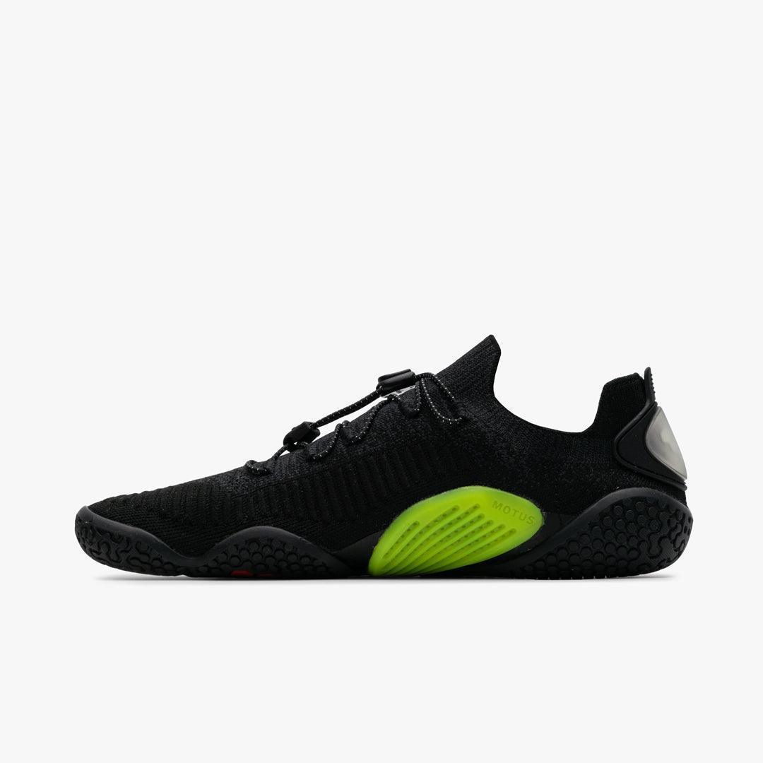 Black lightweight athletic shoe with breathable knit upper and neon green arch support