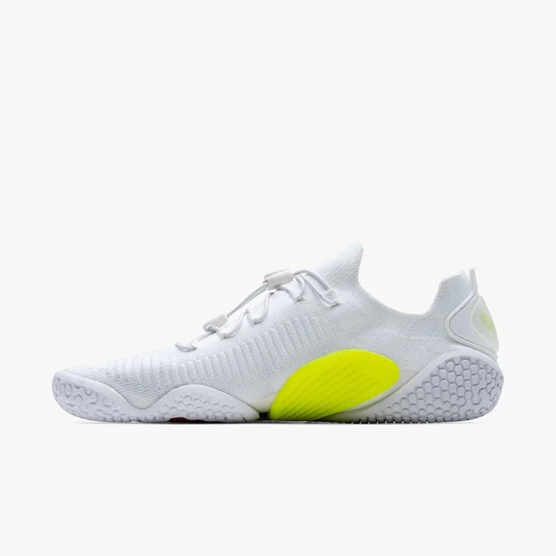white athletic sneaker with sock-like knit upper and bright yellow arch support, textured sole