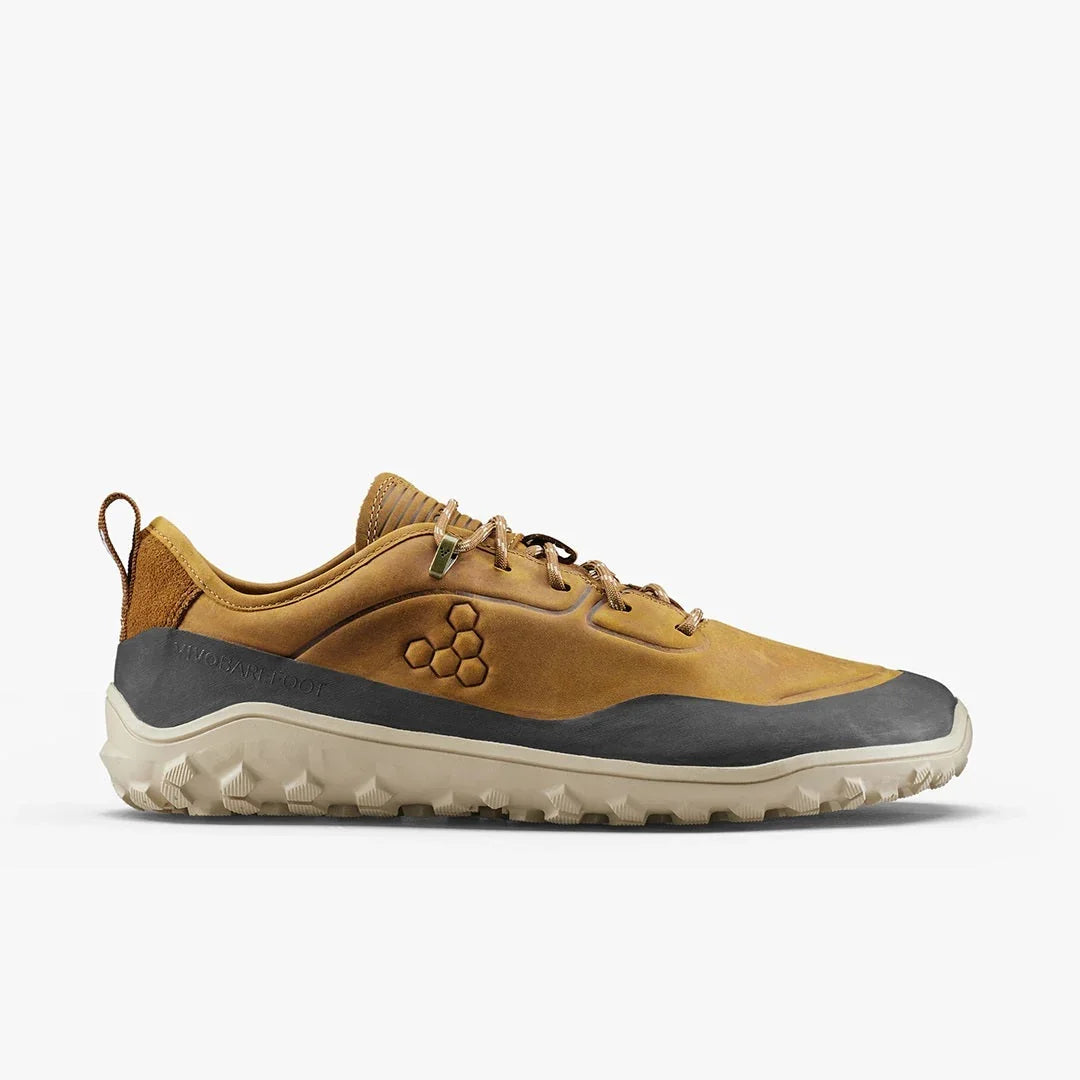 Side view of brown minimalist trail running shoe with beige sole and hexagonal logo