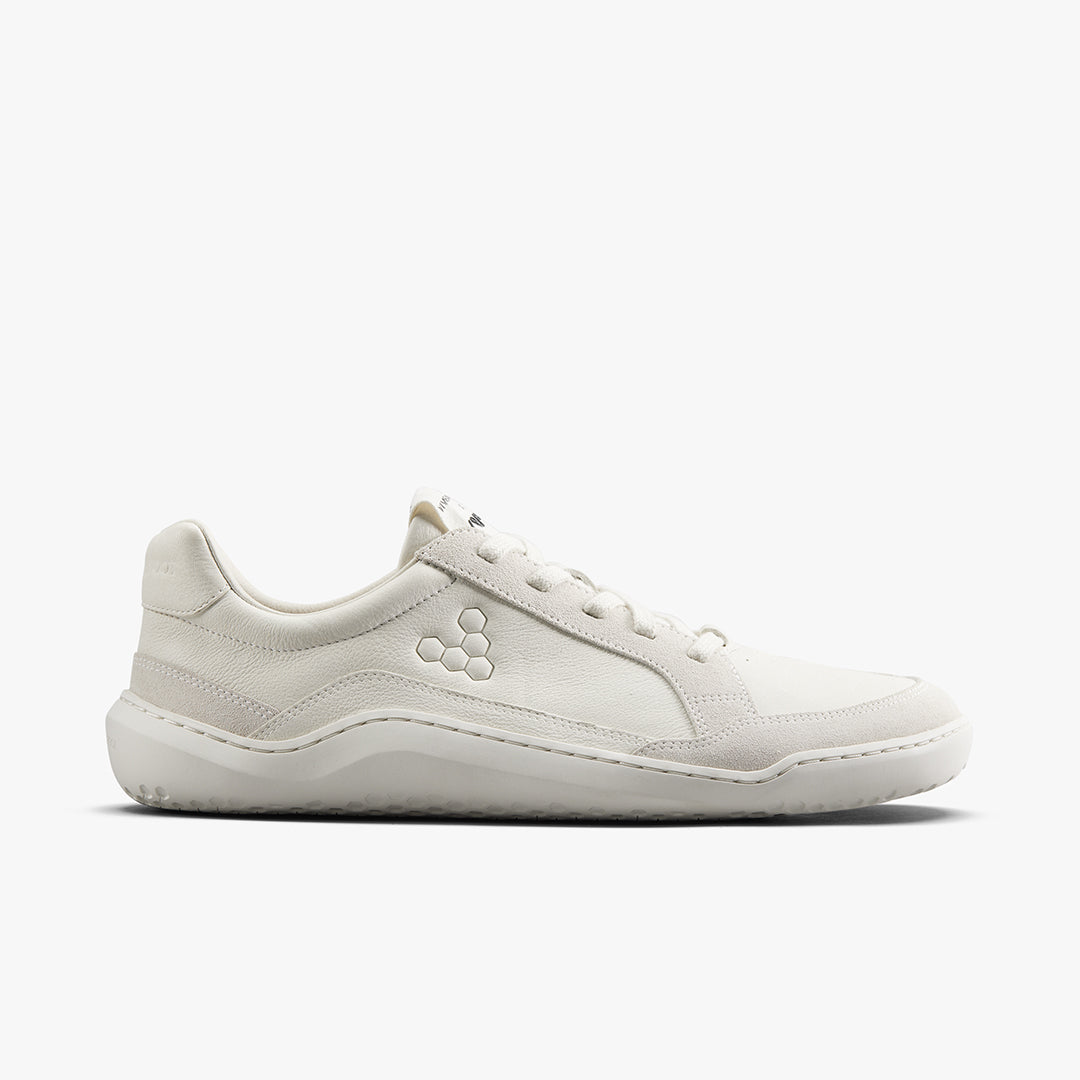 Leopard print sneaker with beige sole on a white background
