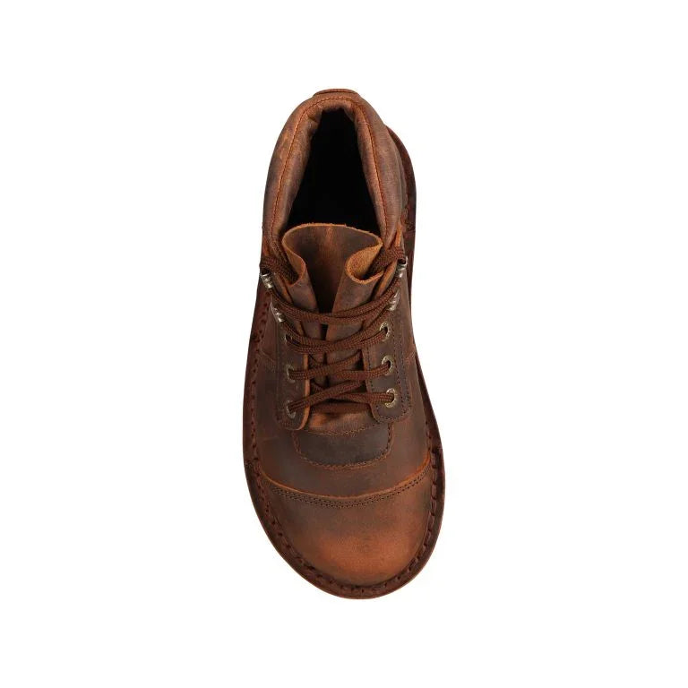 Brown leather boot on a white background