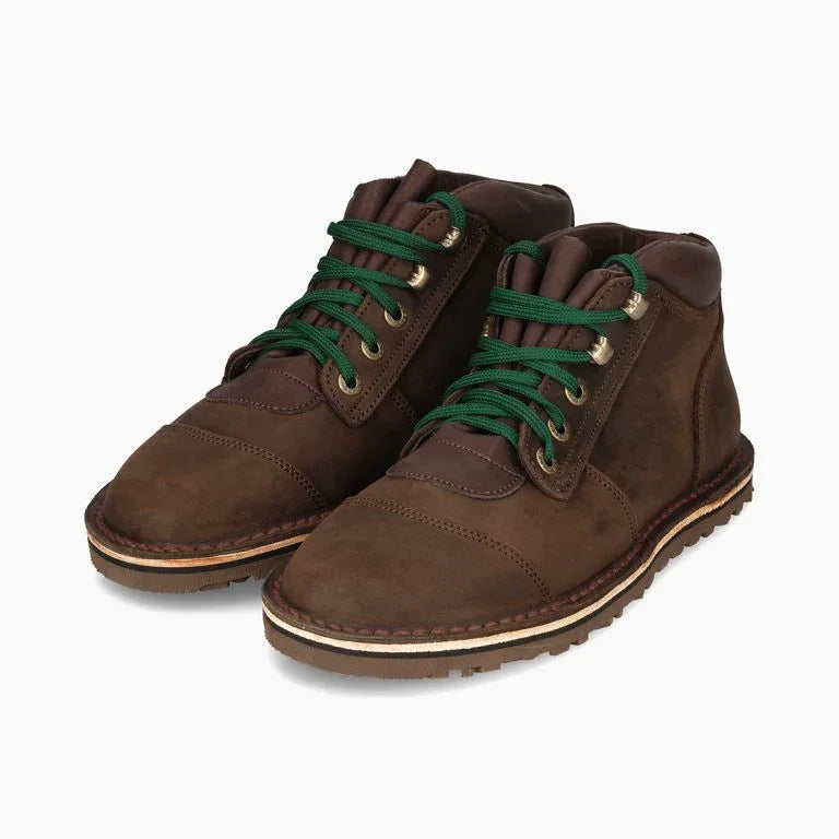 Brown sustainable barefoot boots with green laces on white background, The Grounded Sole