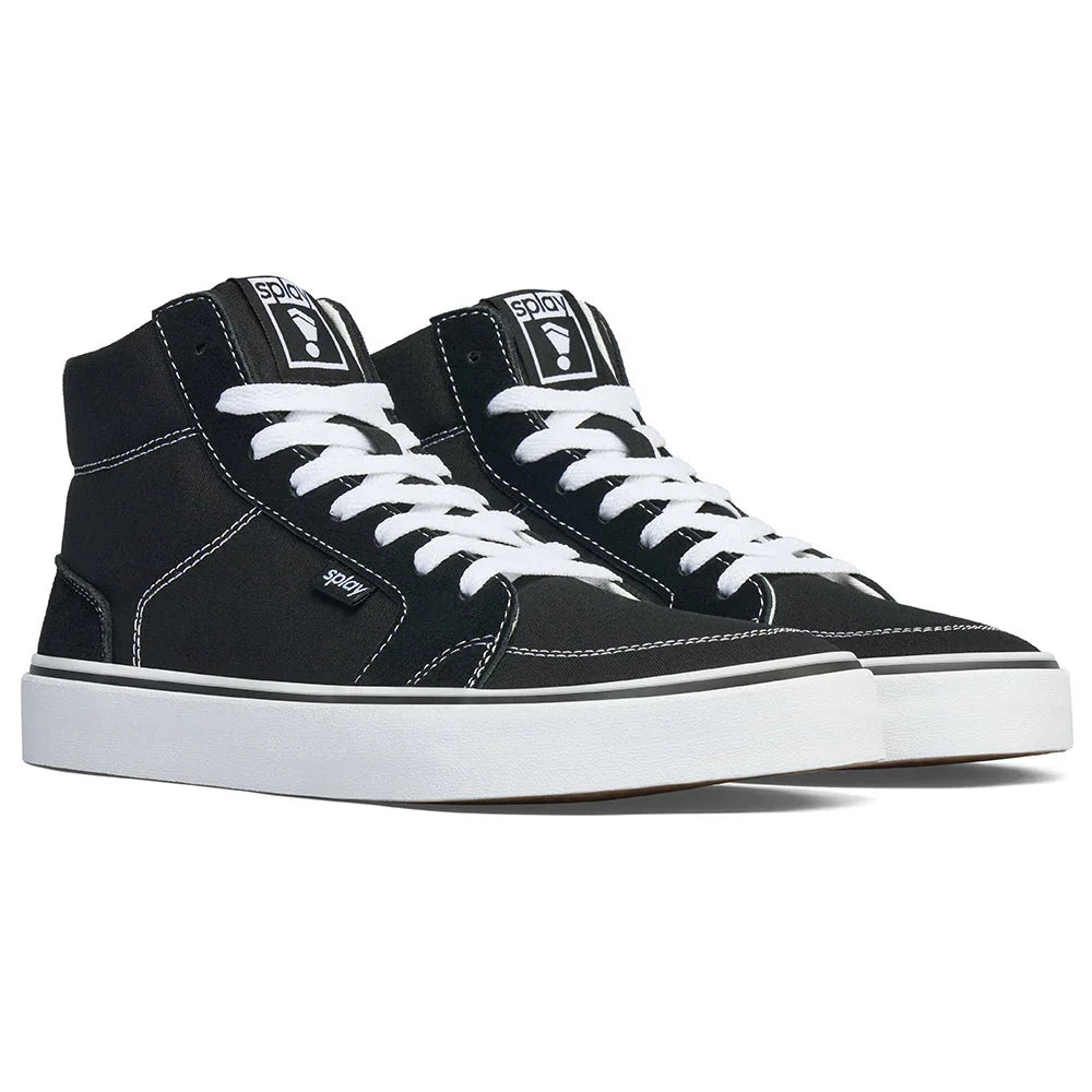 Black high-top canvas sneakers with white laces and thick white soles on white background