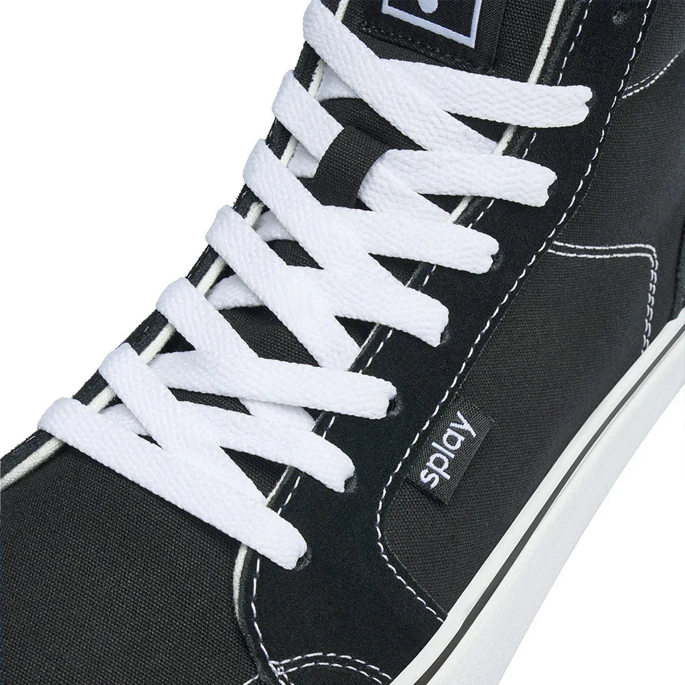 Close-up of black high-top sneaker with white laces and white stitching featuring Splay brand tag