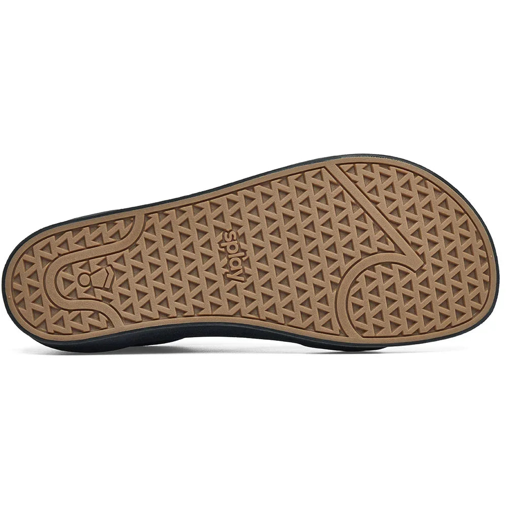 Close-up of Adidas shoe sole with brown textured grip and logo imprint