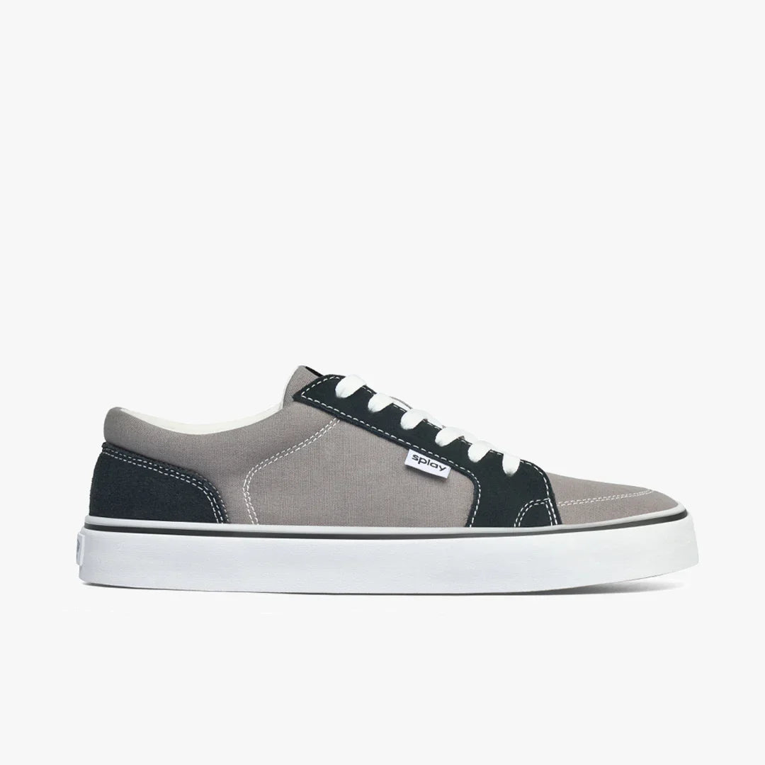 Gray and black low-top canvas sneaker with white laces and thick white sole