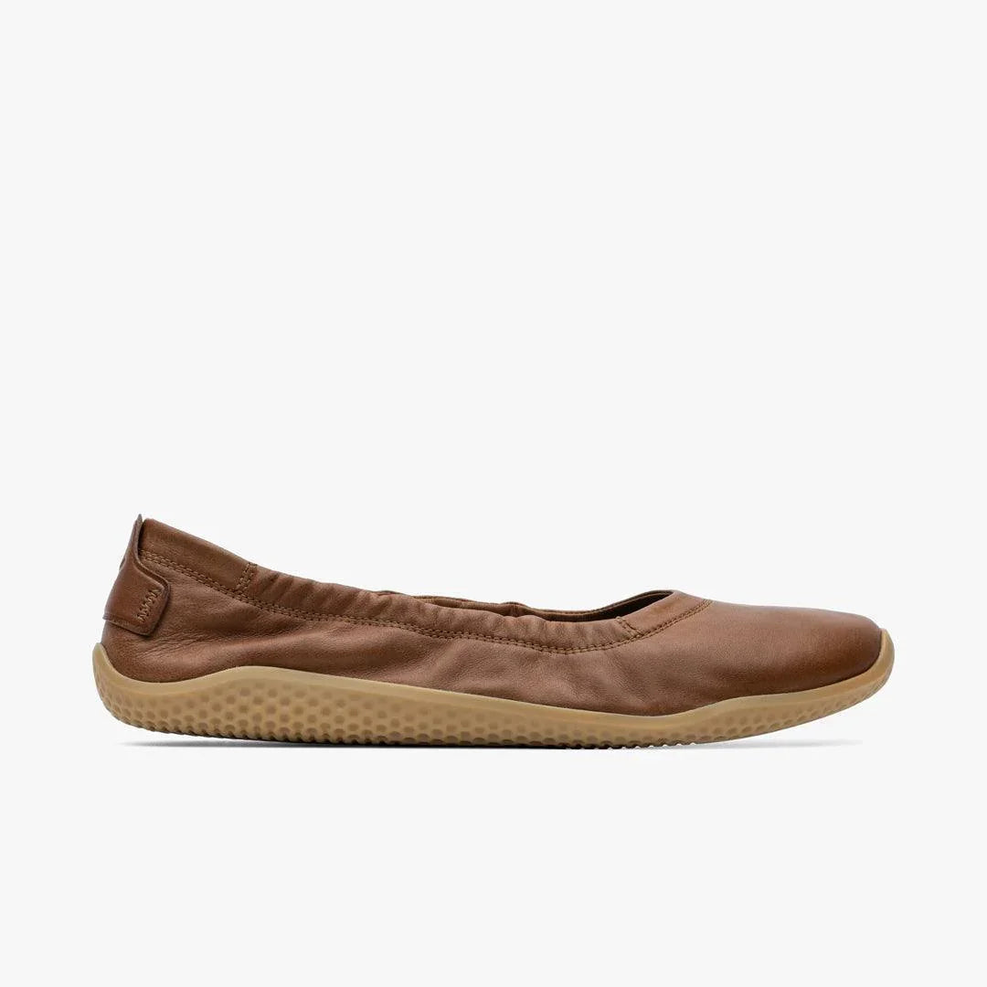 Tan Vivobarefoot Primus Asana Yin Ballerina women's barefoot shoe with natural sole, side view