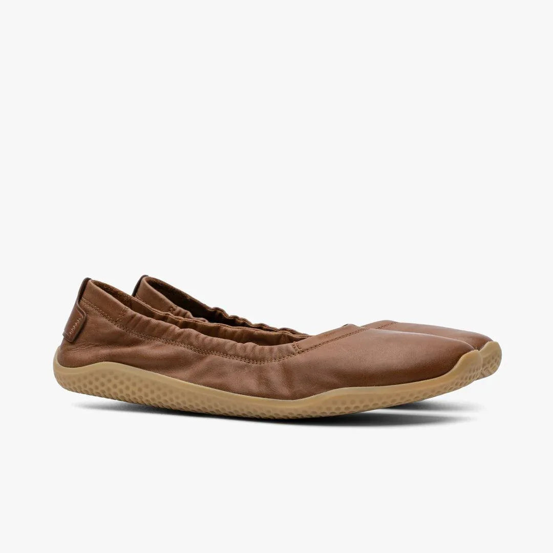 Women's tan barefoot ballerina shoes with flexible sole, eco-friendly design on white background