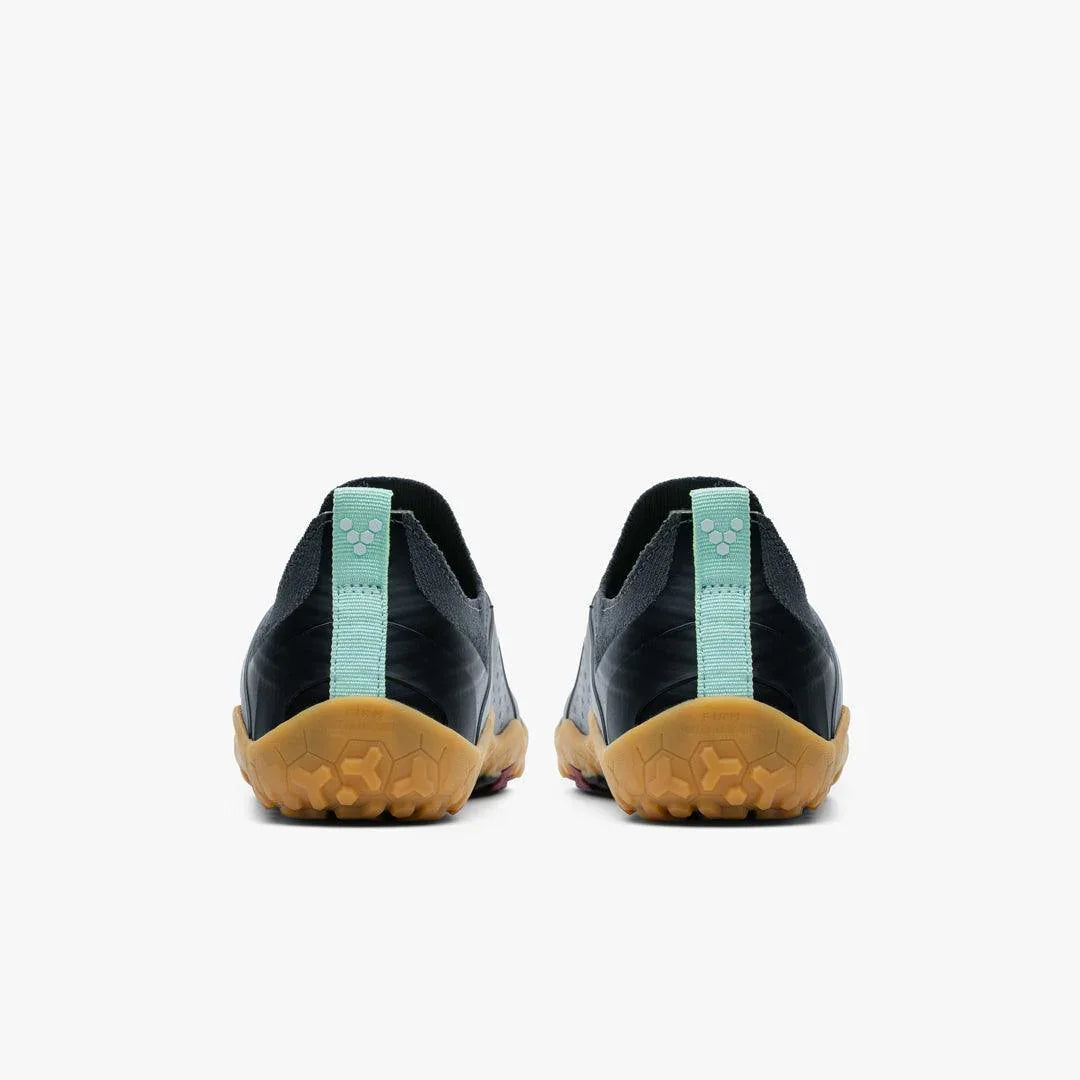 Rear view of Vivobarefoot Primus Trail Knit FG men's barefoot shoes in graphite and gum