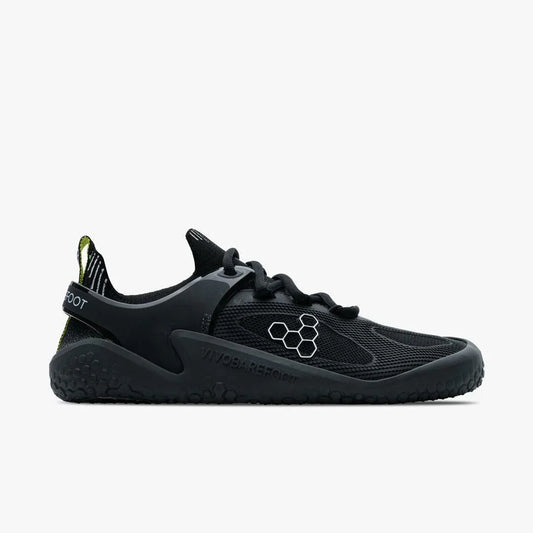 Side view of black Vivobarefoot Motus Strength men's minimalist running shoe with hexagonal logo